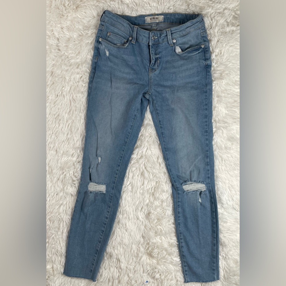 we the free jean light washed ripped size 25